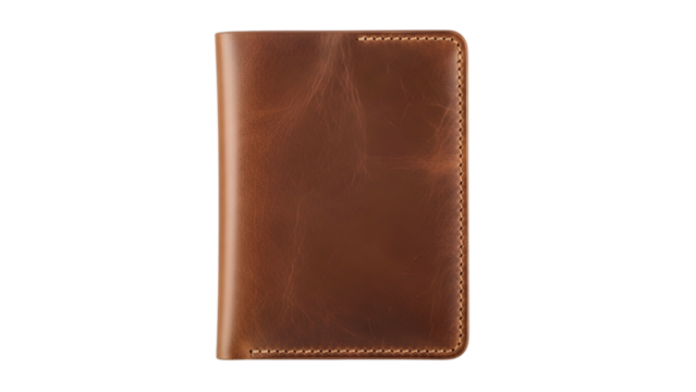 A closed, upright, rectangular leather journal in shades of brown against a black backdrop