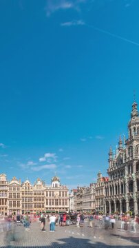 The Grand-Place (Grote Markt) timelapse hyperlapse in Brussels, Belgium. Brabantine Gothic Town Hall, Baroque guildhalls and bustling tourists in the historic city center. UNESCO World Heritage Site