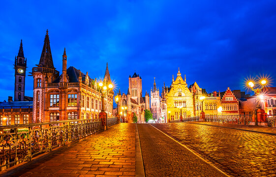 Scenic view of Graslei historical downtown from the Sint-Michielsplein bridge over River Leie with St. Nicholas Church