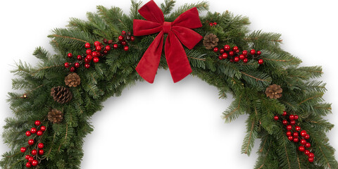 Festive evergreen archway adorned with red berries pinecones and a velvety red bow for holiday decor