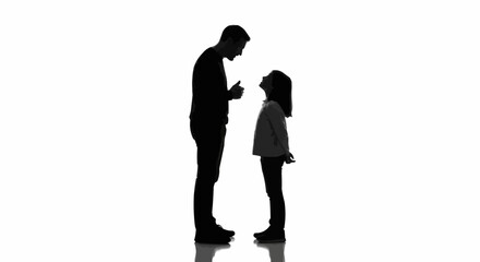 Silhouette of a father having a serious conversation with his daughter.