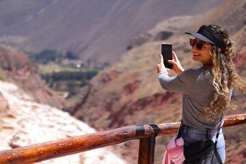 A Woman Visiting the Ancient Salt Mines of Maras