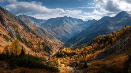 Panoramic autumn mountain landscape with colorful fall foliage, rolling hills, and crisp clear sky creating serene outdoor scenery