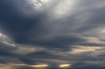 Layered grey evening clouds with soft light