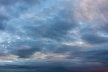 Soft evening clouds with muted blue and purple tones