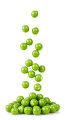 Fresh green peas in motion falling onto pile on white backdrop