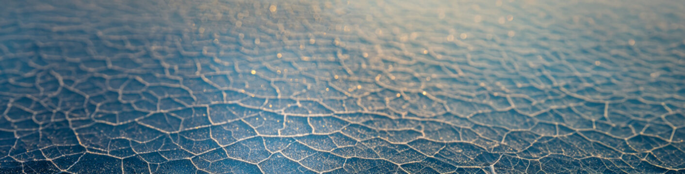 4K Ultrawide Soft focus snowy surface panoramic background - The mesmerizing textures and colors of fractured glass