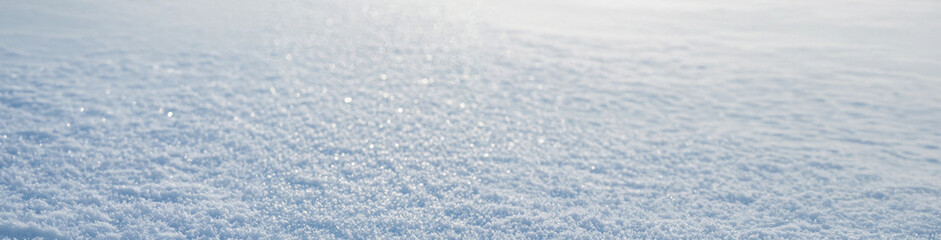 Obraz premium 4K Ultrawide Soft focus snowy surface panoramic background - A tranquil scene of pristine snow covering the landscape