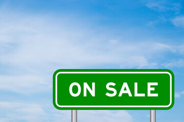 Green color transportation sign with word on sale on blue sky with white cloud background
