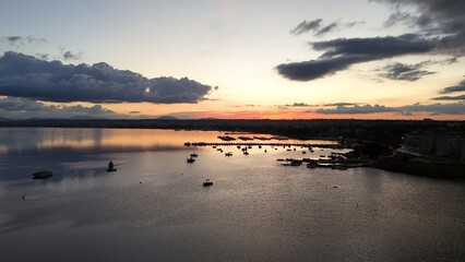 Insanely beautiful drone photography of a scenic sunrise, early in the morning, by the salt marshes in Marsala, Sicily, during a lovely morning.	
