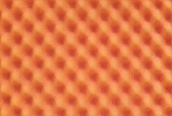 Orange colored egg crate foam sheet packing material dimples background texture.