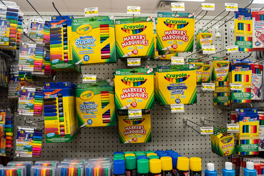 View of assorted Crayola markers and crayons displayed on store shelf. Toronto, Canada - November 26, 2025.