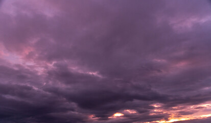 Fototapeta premium Dramatic evening sky with colorful clouds after storm. 