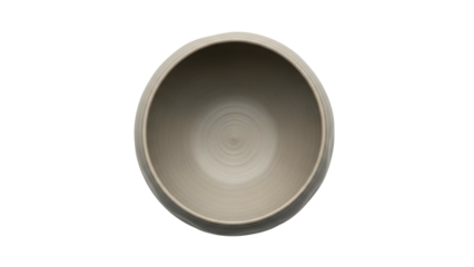 Overhead shot of a plain, light-colored ceramic bowl against a stark black background