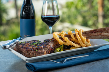 Tomahawk ribeye steak with truffle fries.
