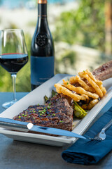 Tomahawk ribeye steak with truffle fries.