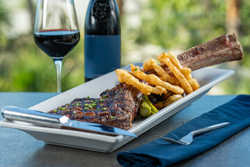 Tomahawk ribeye steak with truffle fries.