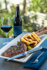 Tomahawk ribeye steak with truffle fries.