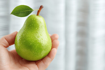 Green Pear in Hand – Natural Food, Minimalist Composition