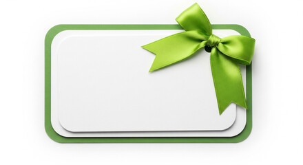 Festive green bow on blank gift tag ready for your personal message