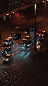 Night-time Traffic Flow in a Modern City, Captured from Above
