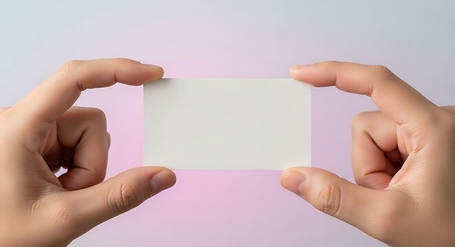 Hands holding blank business card with clean minimalist background design