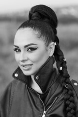 girl with artistic makeup in leather shorts