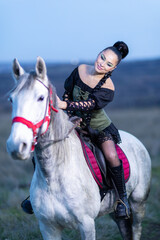 Charming European lady posing with a majestic white horse in an open field, symbolizing freedom, calmness, and connection with nature.