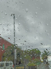 rainy day seen through a car window