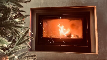 Warm Fireplace with Partially Visible Christmas Tree – Holiday Interior Scene