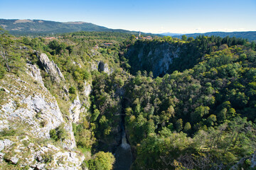 crater of a huge cave system in slovenia © Fizzl