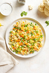 Cauliflower fried rice with carrot, green pea, corn, scrambled eggs
