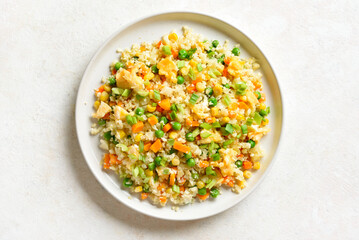 Cauliflower fried rice with carrot, green pea, corn, scrambled eggs