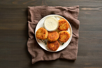 Breaded fish cakes from mashed potato and minced fish
