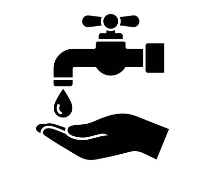 A single drop of water falls from a faucet into an open hand.