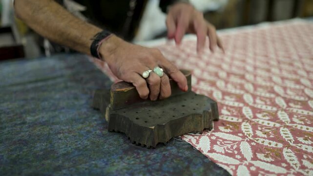 Hand-block printing from Jaipur, Rajasthan, timeless cotton textiles stamped with intricate floral and folk motifs using carved wooden blocks and natural dyes, echoing generations of craft heritage.