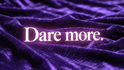 Motivational text with the words Dare more