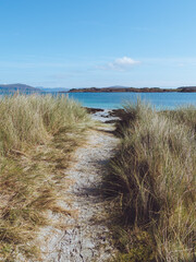 A path through the dunes down to the white sandy beaches of Iona, Scotland