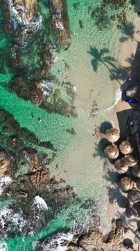 Amapas Beach with turquoise waters and sand on the rocky coast of Puerto Vallarta