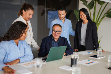 Fototapeta premium Multiracial business people working on financial strategy inside office - Multi generational team, colleagues and corporate concept