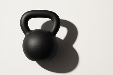 Black Kettlebell Close Up with Shadow on White Background. Kettlebell, fitness, strength, gym, workout, training, exercise
