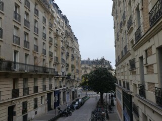 Paris, November 2025 : Visit of the magnificent city of Paris, Capital of France - View on different facades of buildings built by Baron Haussmann