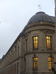 Paris, November 2025 : Visit of the magnificent city of Paris, Capital of France - View on different facades of buildings built by Baron Haussmann