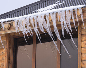 icicles hanging from a roof