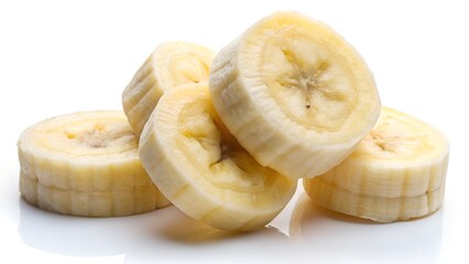 Pile of freshly sliced banana pieces on a white background ready to eat or use in recipes