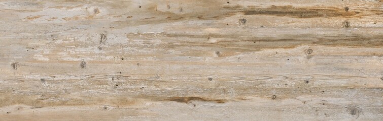 Fototapeta premium natural wooden surface with dark grains and weathered plank details, beige wooden surface for flooring and interior design