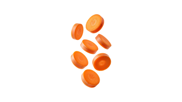 Fresh carrot slices falling isolated on transparent background
