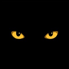 Obraz premium Glowing yellow eyes in the dark, a mysterious and watchful presence