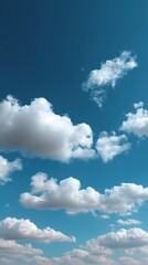 Obraz premium Beautiful white clouds floating in a vibrant blue sky on a sunny day