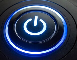 Close-up of a round power button illuminated with a bright blue glow, set against a dark, textured surface
